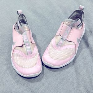 Pale pink and gray Nike shoes
